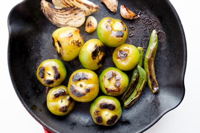 Tomatillos roasting for salsa.