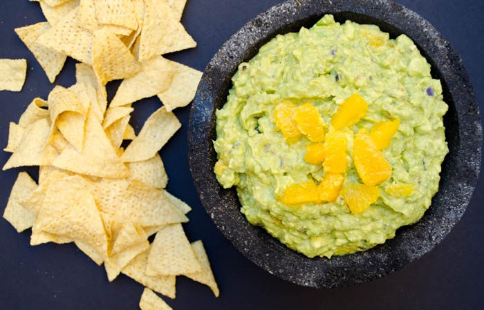 Roasted garlic and orange guacamole, sweet orange contrasts with the creamy avocado, the smoky roasted garlic and chiles permeate throughout