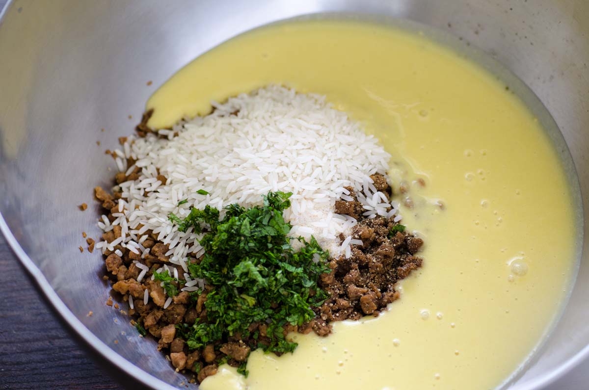 Vegan Mexican meatball soup ingredients in a large saucepan.