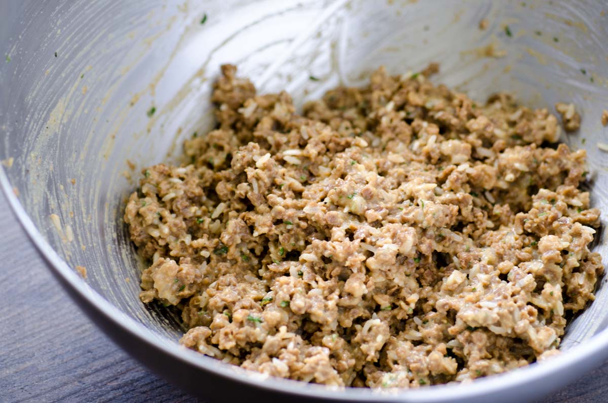 Vegan chickpea tuna salad combined in a metal mixing bowl.