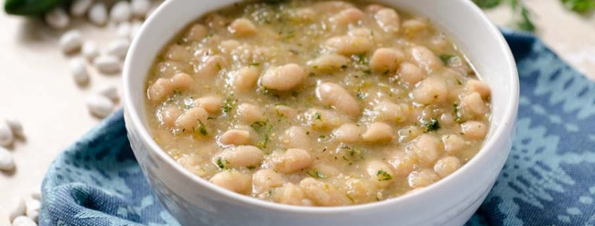 These tomatillo poblano white beans are a warm stew of perfectly creamy beans, tomatillos, spicy poblano pepper, onion, cumin, and oregano.