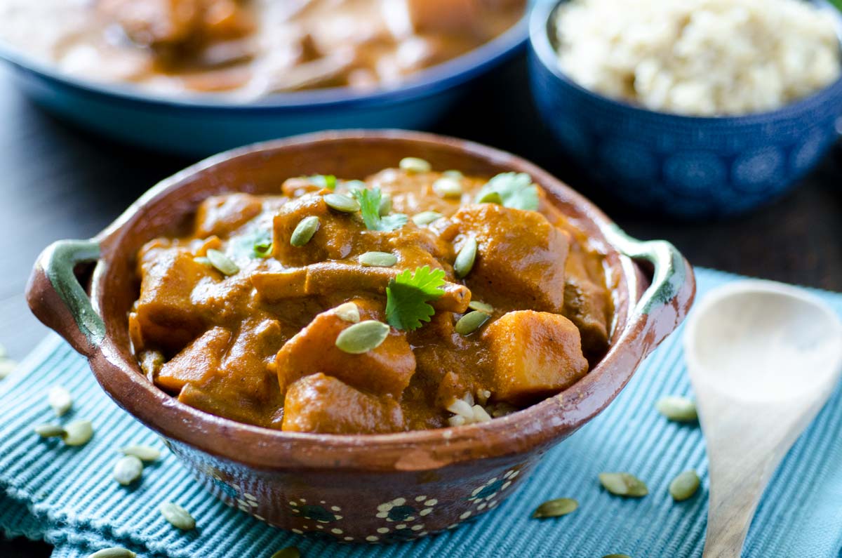 Pipian Rojo Over Rice recipe is perfect for the coming fall and winter months. The sauce is very hearty and made with roasted pumpkin seeds.