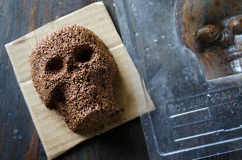 A chocolate amaranth skull released from the chocolate mold.