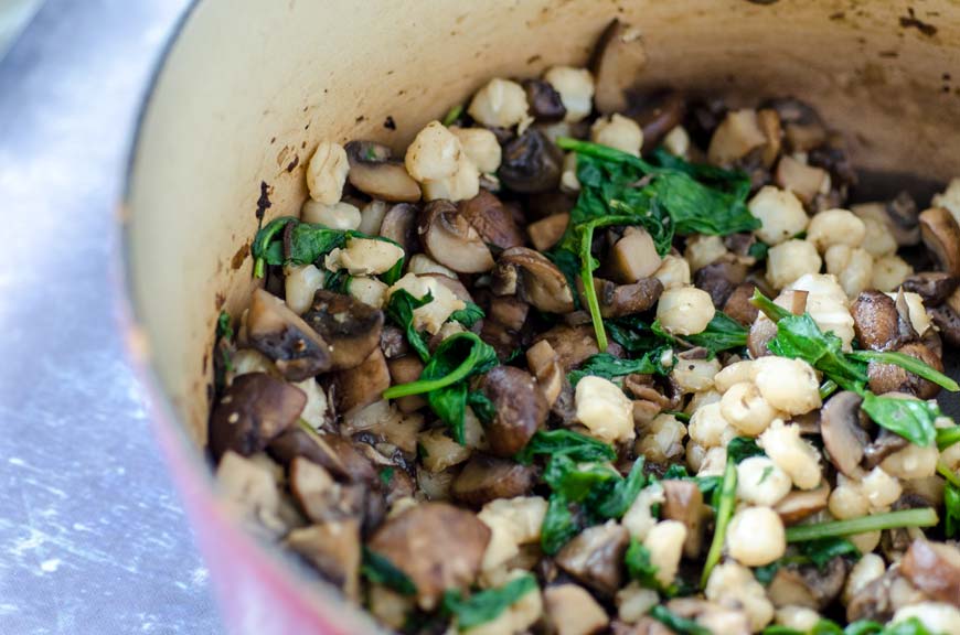 Buddha bowl ingredients in a dutch oven.