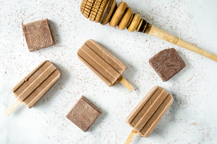 These Mexican hot chocolate popsicles (paletas de chocolate) are creamy and sweet, chocolaty and rich, with a touch of cinnamon.
