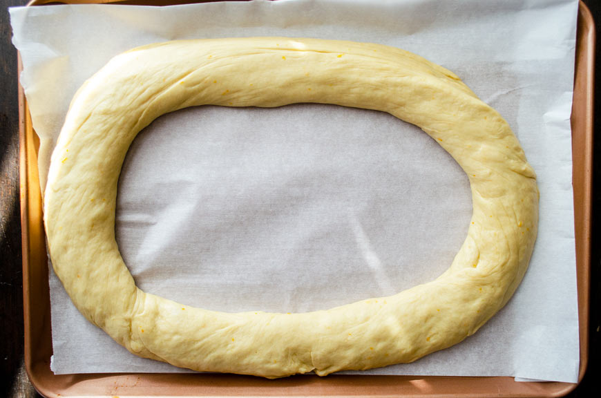 Dough rolled out and formed into an oval shape, place on a sheet tray. 