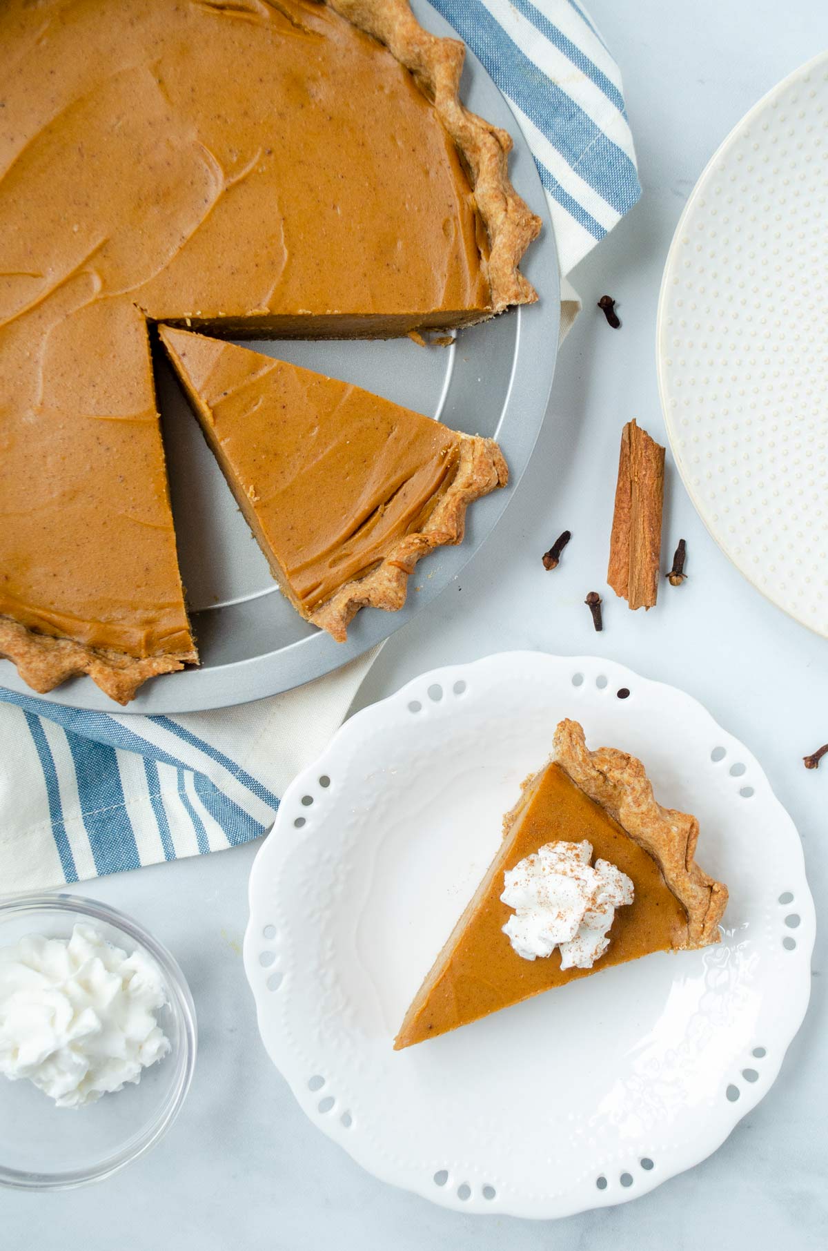 sweet potato pie on a blue and white napkin