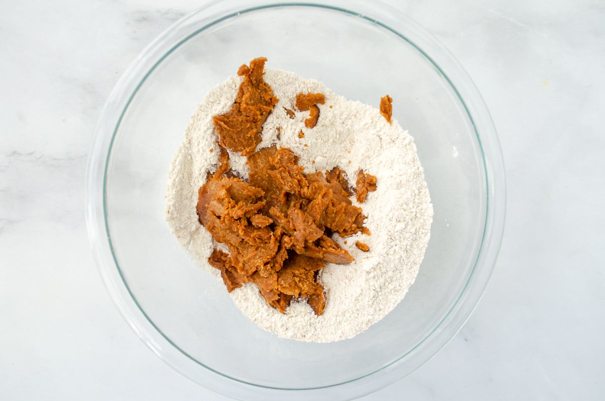 glass bowl with flour, almond butter, salt