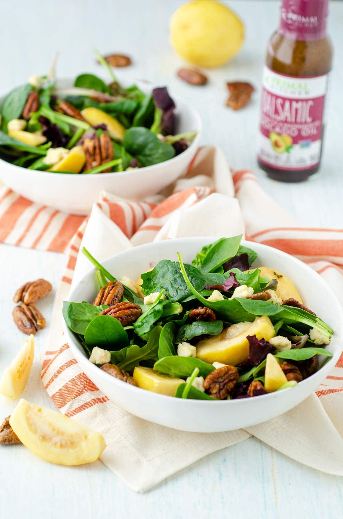 two bowls of guava salad with red and white towel