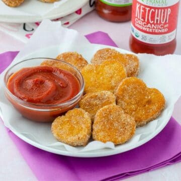 plate of tofu nuggets with a small bowl of ketchup