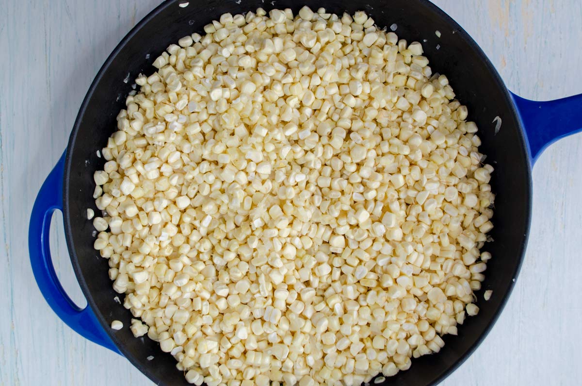 Blue saute pan with corn kernels