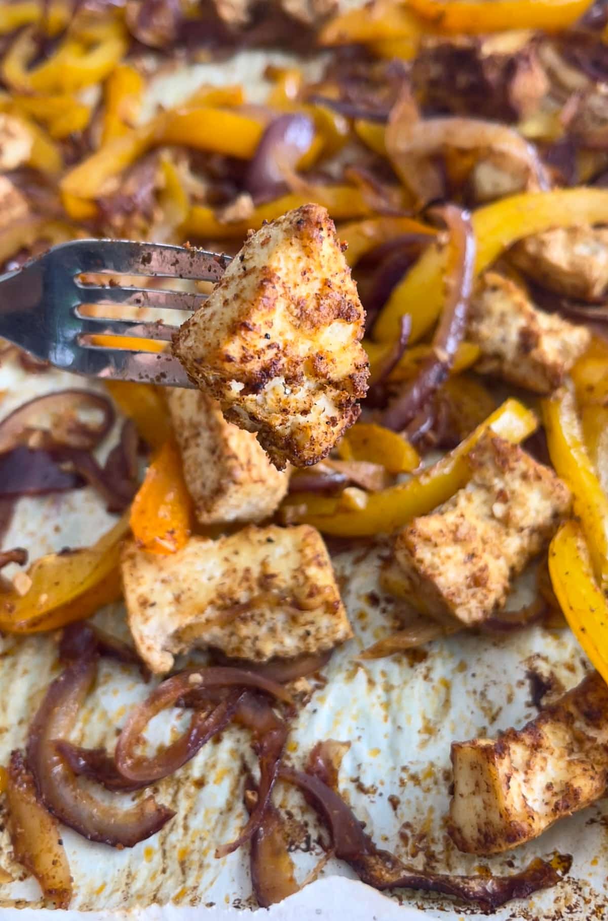 a piece of tofu fajitas on a fork