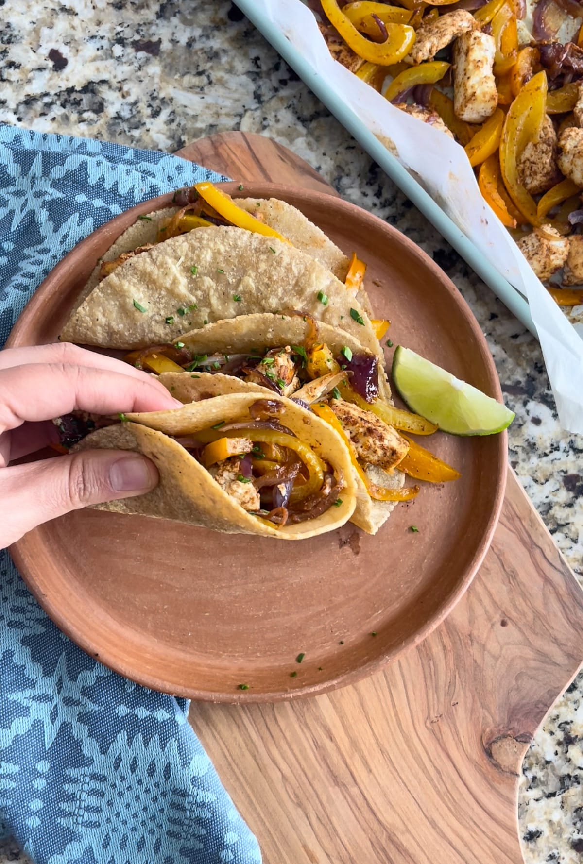 a plate of tofu fajitas tacos