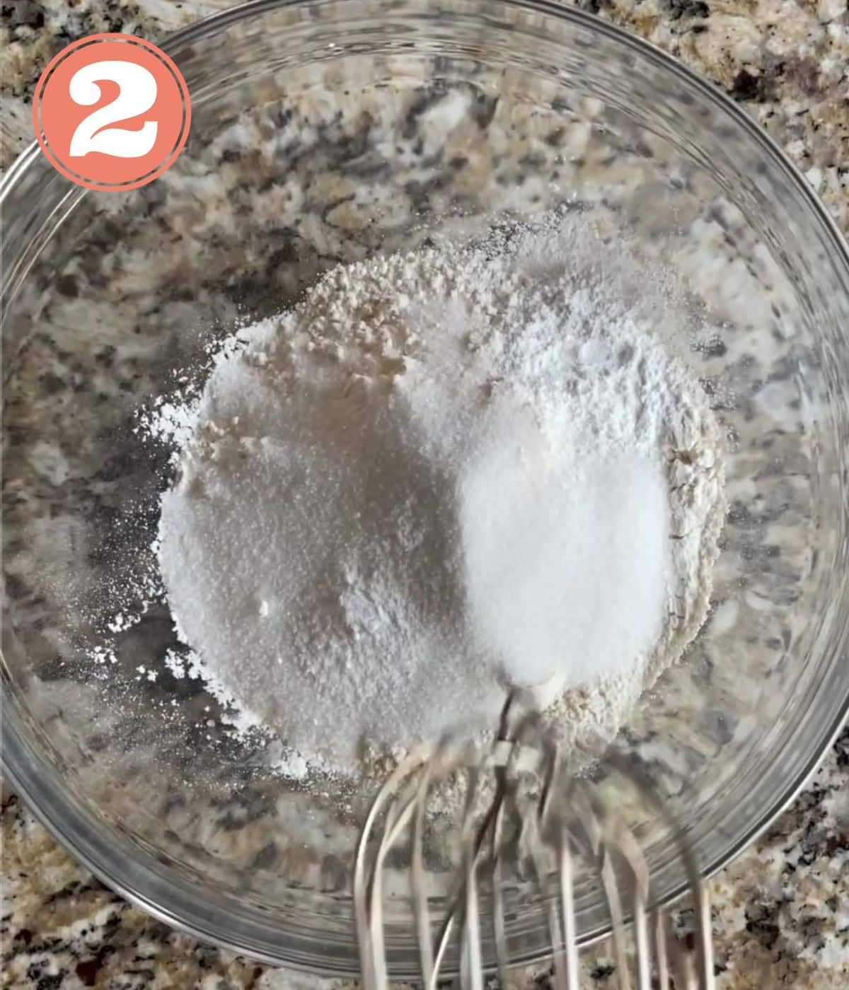 flour, sugar, baking powder, baking soda in a glass bowl