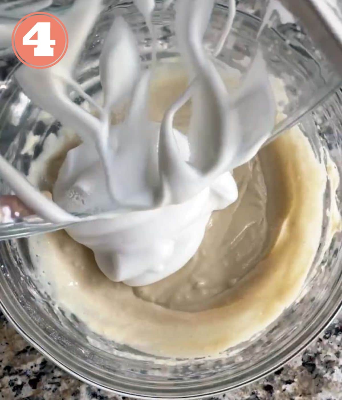 whipped aquafaba added to the bowl with the batter