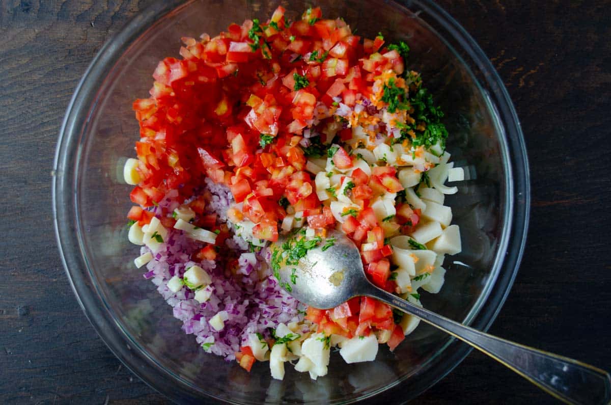 ingredients being mixed by a spoon