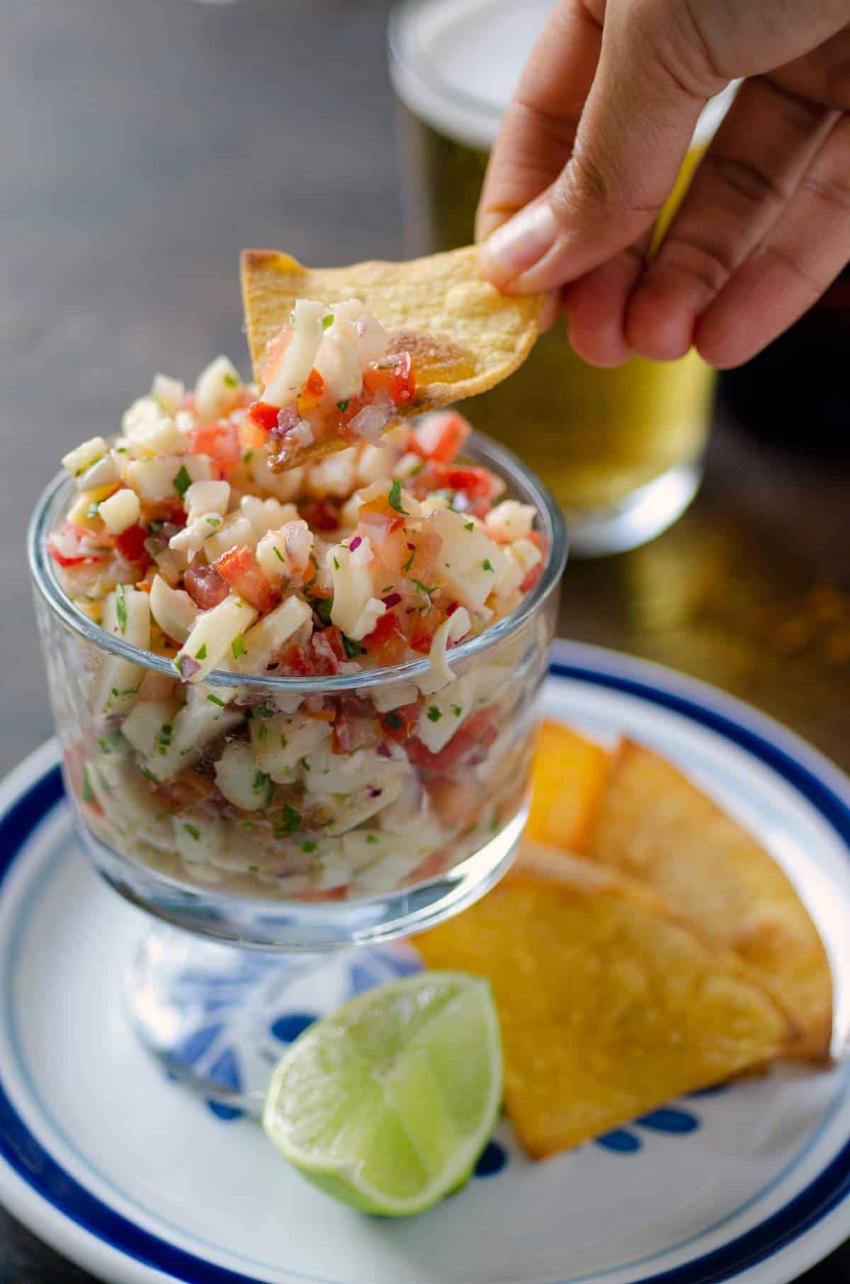 ceviche and beer in the background