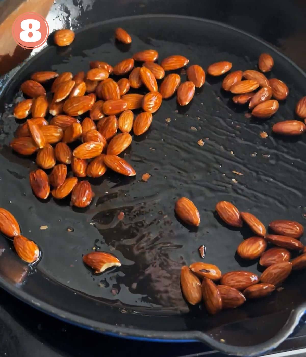 almonds frying in a pan