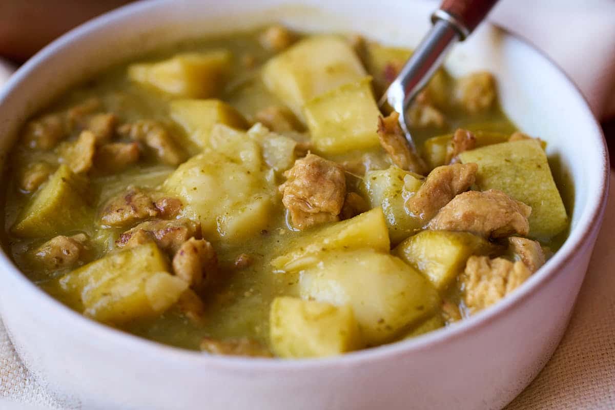Soy curls, potatoes, and squash in a chile verde sauce.