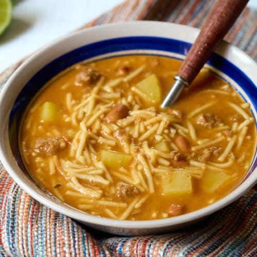 Fideo loco in a white and blue bowl.