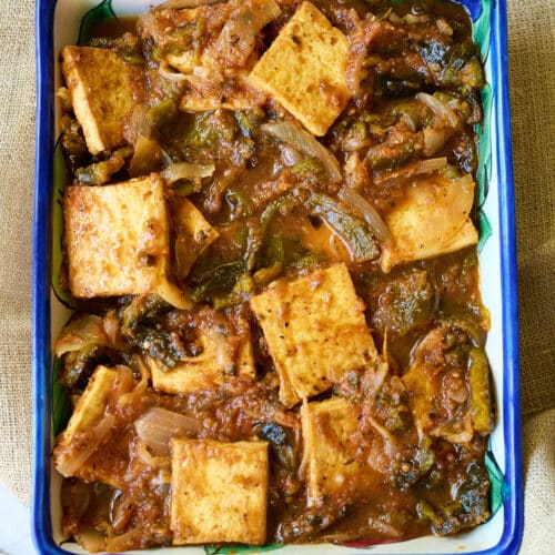 Poblano and Tofu Stew in a white and blue talavera casserole.