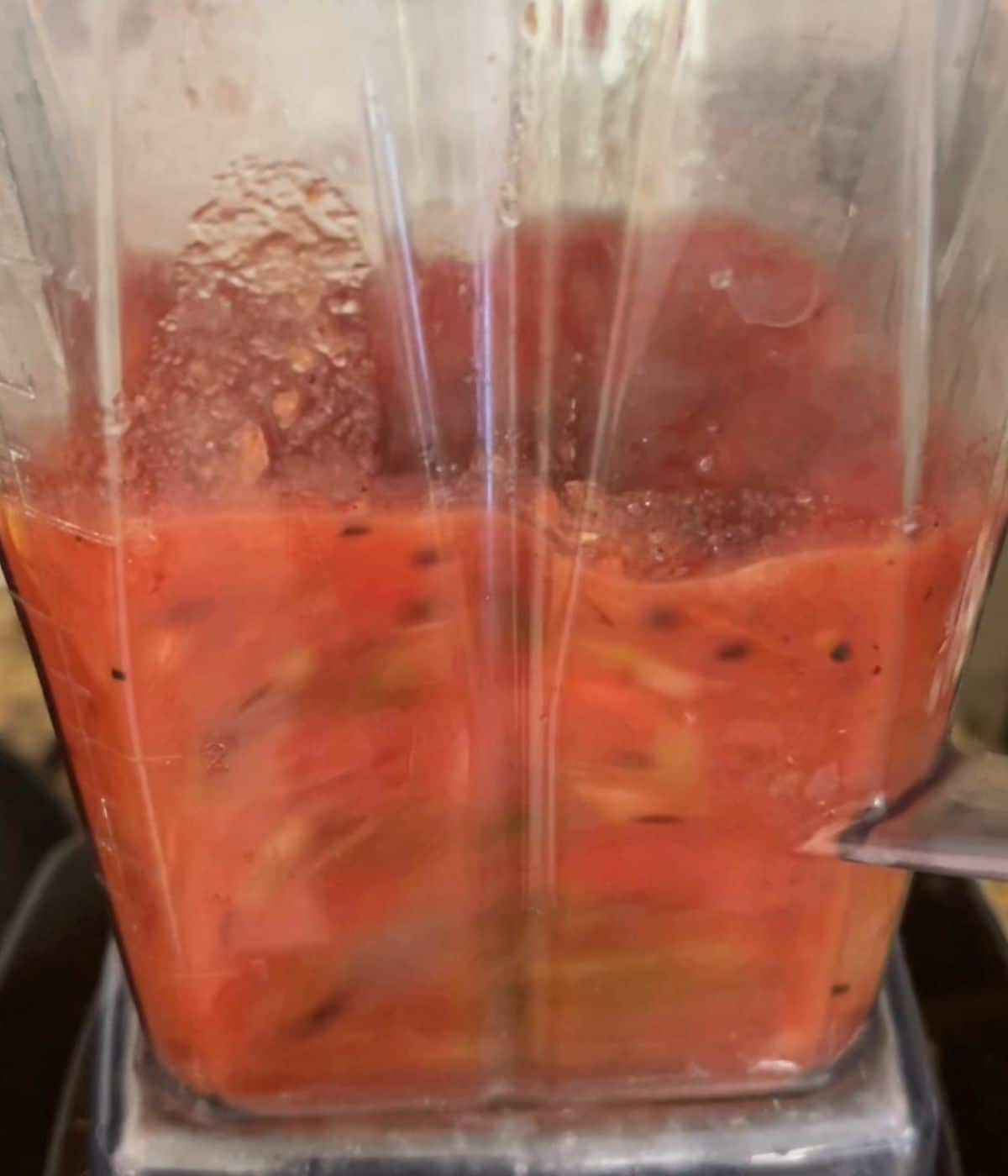 Salsa being blended in the blender.