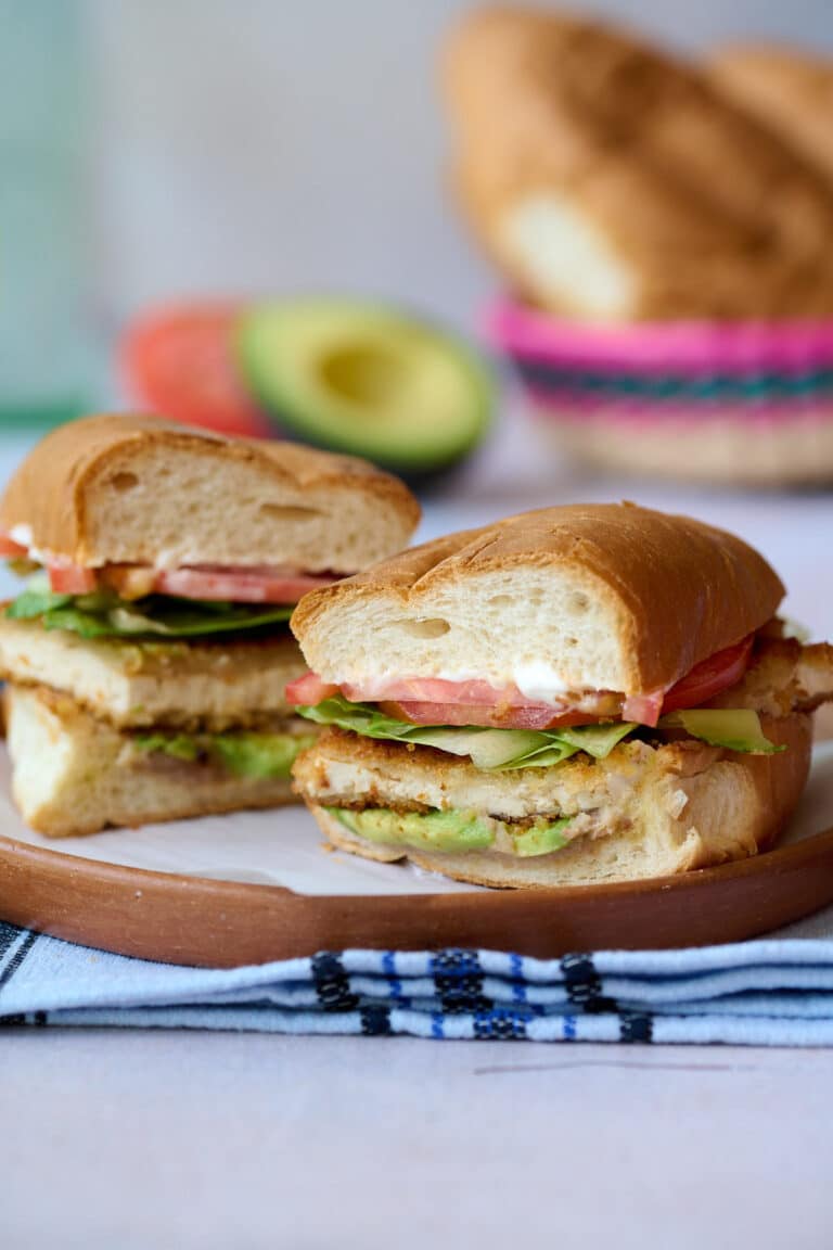 Torta de milanesa on a clay plate.
