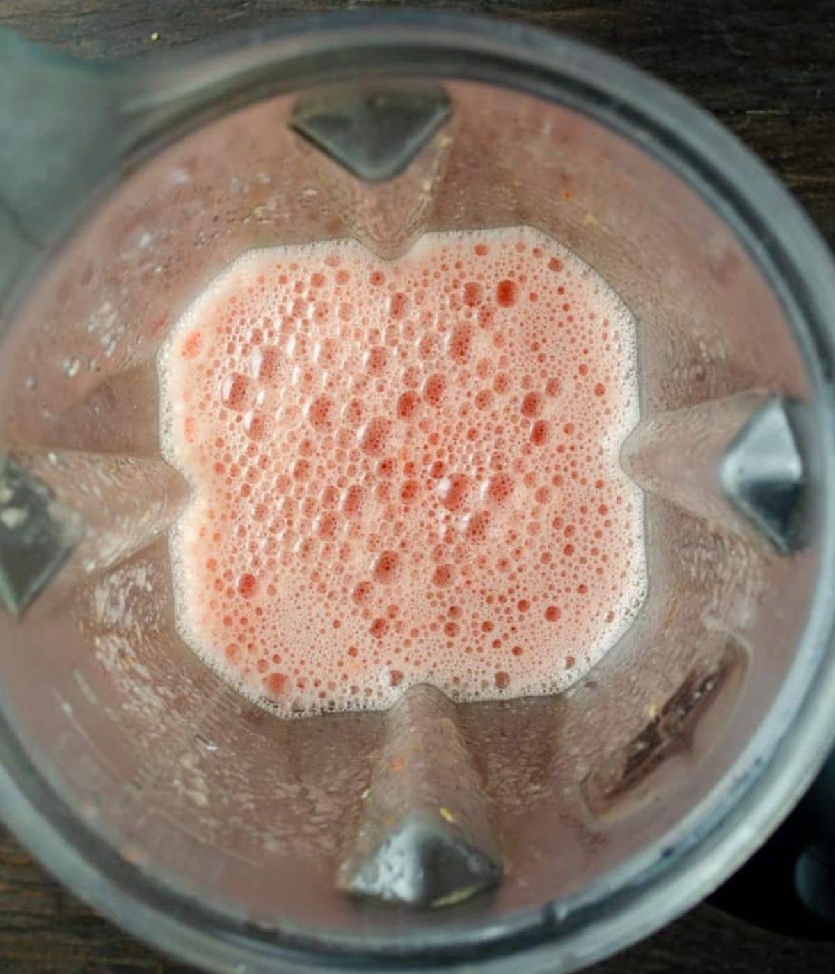 Tomato puree in the blender for sopa de fideo.